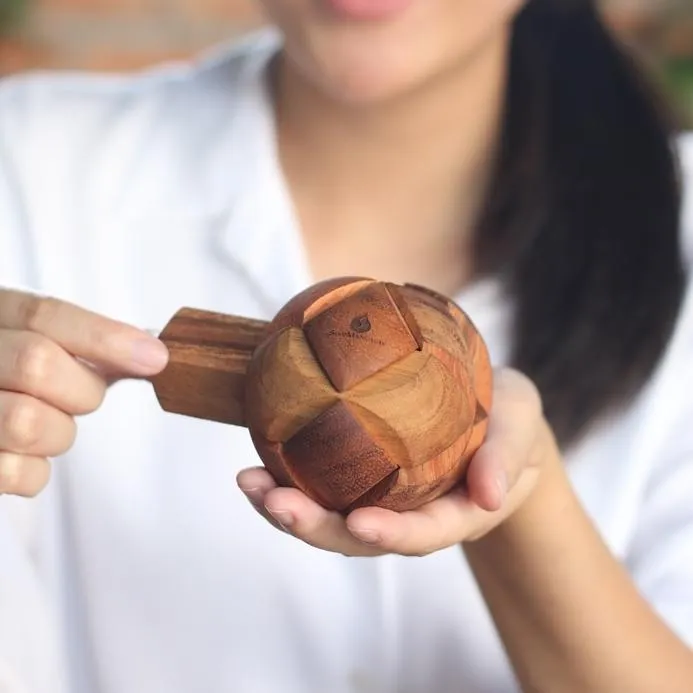 Fathers Day gift_ Brain teaser puzzle Football shape natural wood- can Dad put it back together